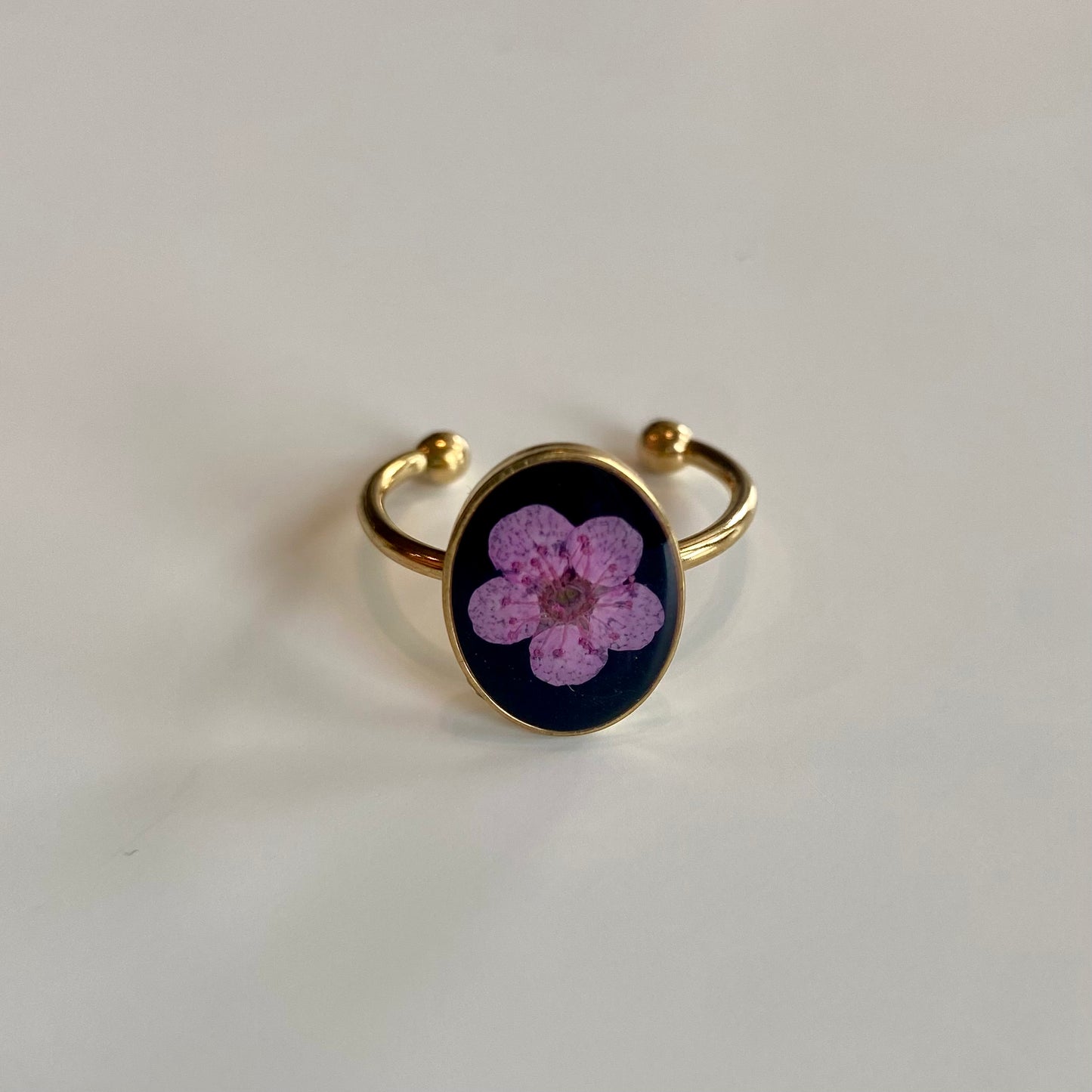 Adjustable Oval Black Flower Ring